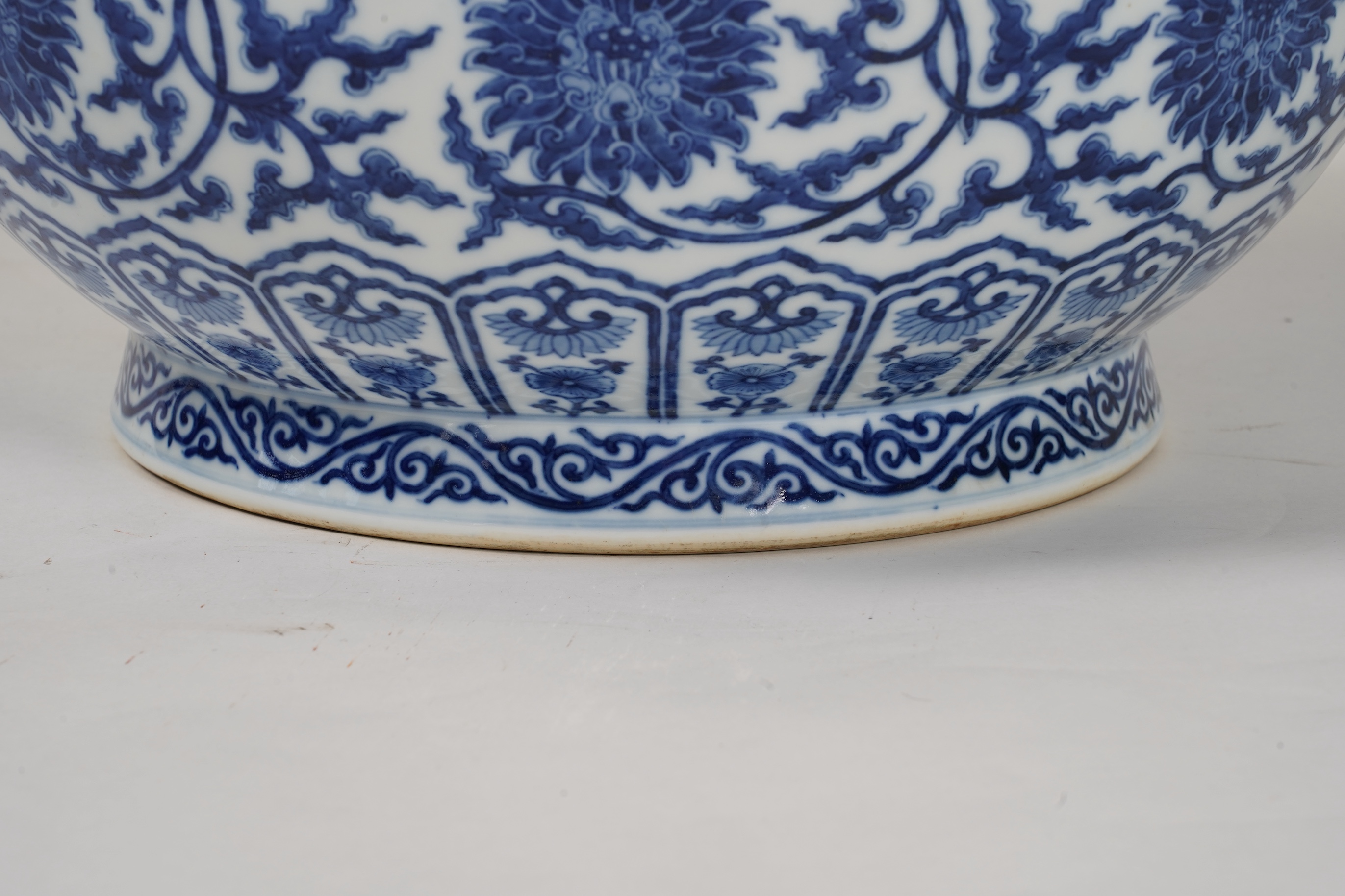 A large Chinese blue and white pear shaped vase, hu, Qianlong seal mark but later